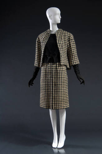 Black and off-white wool houndstooth check jacket with 3/4 sleeves, matching slim skirt and bla…