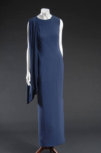 Blue floor length sleeveless dress with draped gathered shoulder swag 