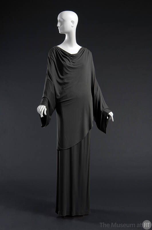 Grey tunic top with long sleeves, asymmetric hem and matching floor length skirt 