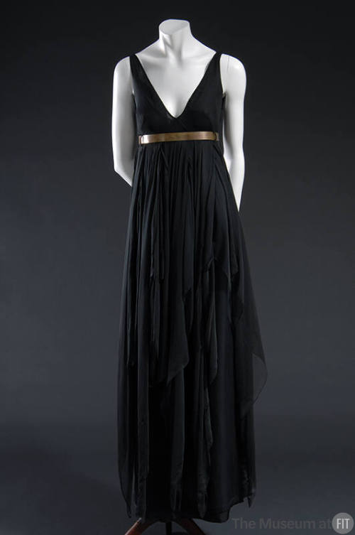 Black silk sleeveless dress with deep V neckline, Empire waist with brass metal belt and  handk…
