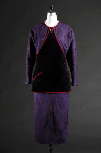 Purple silk damask dress with dark purple fuchsia-trimmed triangular tunic over bodice and tape…