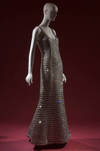 Crystal rhinestone sleeveless evening gown with scoop neckline and floor length flared skirt