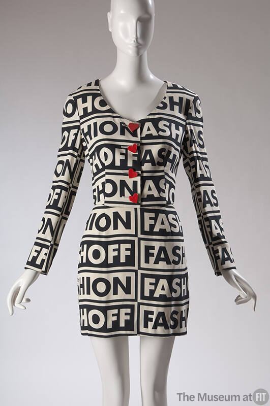Black and off-white suit with repeated Fashion/Fashoff text print, collarless scoop neck jacket…