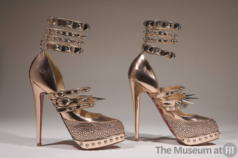 Pair of metallic pink platform high heel pumps with four ankle straps, three instep straps and …