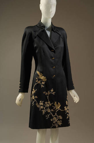 Black coatdress with gold metallic embroidery of birds and cherry blossom branches and gold tig…