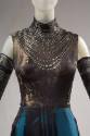 Detail view of black and gold bodysuit showing black lace over gold motif and white multistrand…