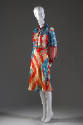Red, white and blue disassembled American flag pattern shirt style dress with long sleeves, but…