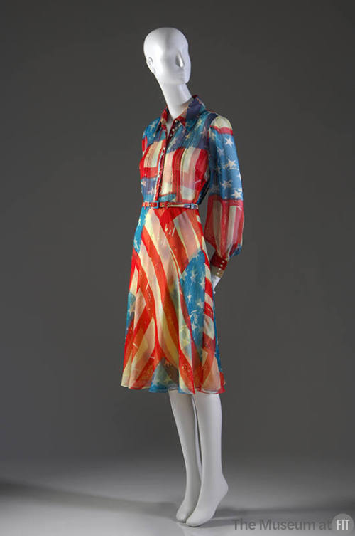 Red, white and blue disassembled American flag pattern shirt style dress with long sleeves, but…
