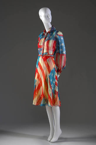 Red, white and blue disassembled American flag pattern shirt style dress with long sleeves, but…