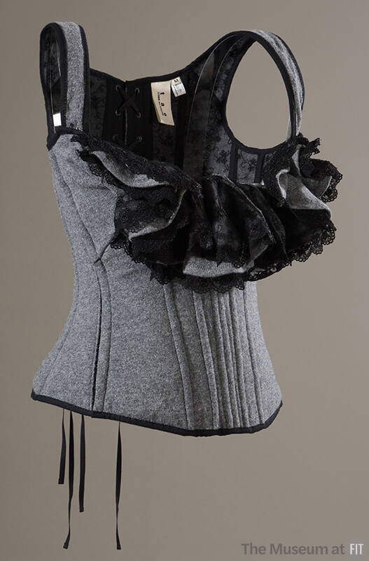 Grey wool corset with shouder straps and black lace trim 