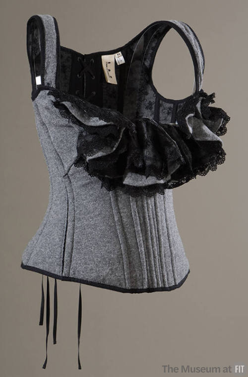 Grey wool corset with shouder straps and black lace trim 