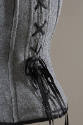 Detail of grey wool corset back lacing