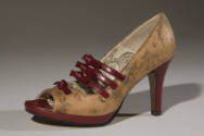 Tan floral print high heel open toe pump with red straps with bows at instep