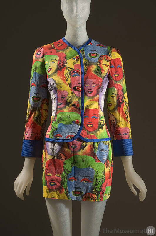 Jacket and matching mini skirt with multicolor print of Marylin Monroe and James Dean, blue tri…