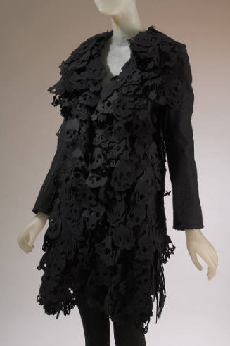 Black wool long sleeve coat with black felt layered skull trim 