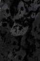 Detail of black felt layered skulls 