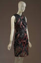 Sleeveless above-the-knee sheer dress with black reptile pattern and red leather intertwined al…