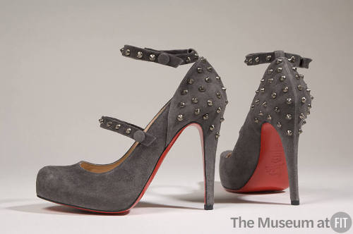 Grey suede high heel ankle strap shoes with silver metal spike at heel and straps 
