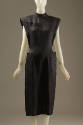 Black below-the-knee dress with cap sleeves and side pockets