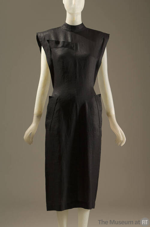 Black below-the-knee dress with cap sleeves and side pockets
