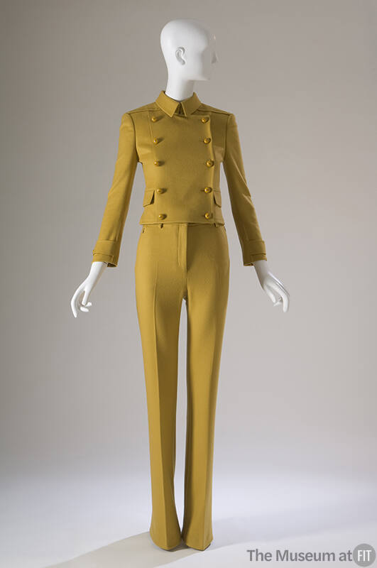 Yellow suit with cropped double-breasted long sleeve jacket with gold buttons and matching pant…