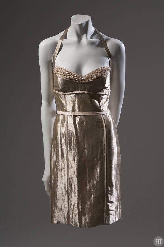 Short metallic gold halter top evening dress with beige satin trim and beads at bustline