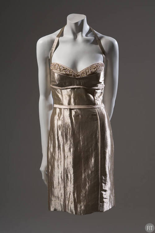 Short metallic gold halter top evening dress with beige satin trim and beads at bustline