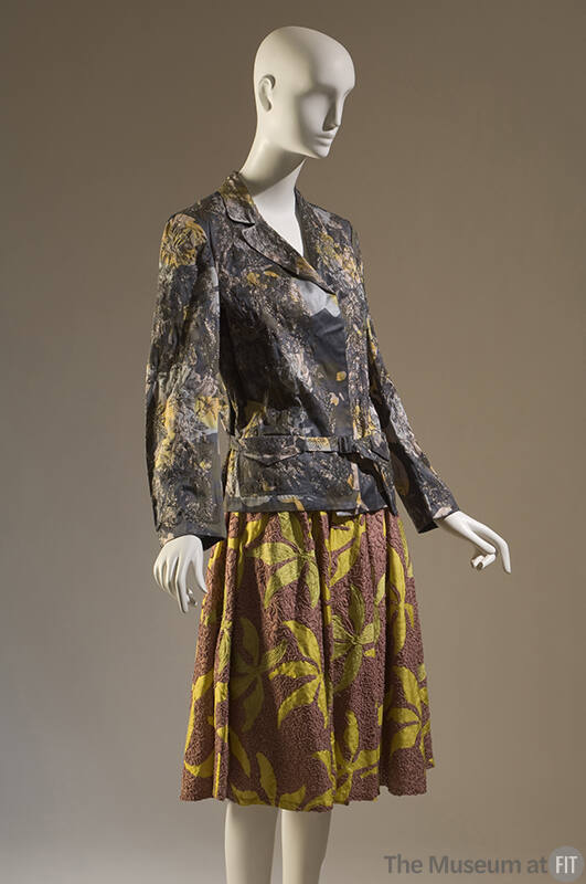 Grey and yellow floral print cotton jacket with notched lapels and pinl gathered skirt with yel…