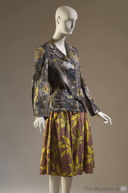 Grey and yellow floral print cotton jacket with notched lapels and pinl gathered skirt with yel…