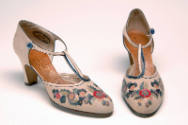 Alternate view of beige D'Orsay shoes showing multicolor floral appliqué on vamp and ankle stra…