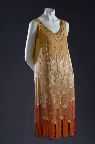Gold sleeveless evening dress with below-the-knee skirt and ombre beaded fountain motif in whit…