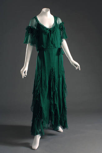 Green silk chiffon evening dress with floor length uneven hemline in allover self-ruffles, wais…