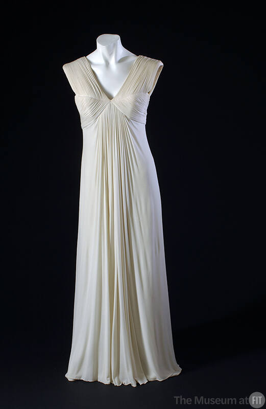 White silk pleated floor length dress, sleeveless, v-neck