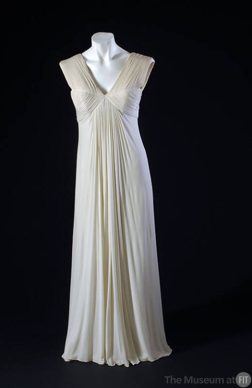 White silk pleated floor length dress, sleeveless, v-neck