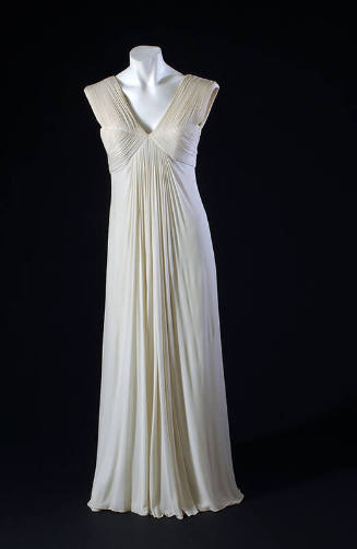 White silk pleated floor length dress, sleeveless, v-neck