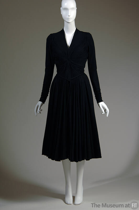 Black long sleeve allover gathered below-the-knee dress with v-neck 
