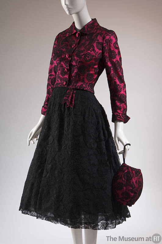 Pink satin with black floral lace overlay button front jacket, black lace below-the-knee dress …