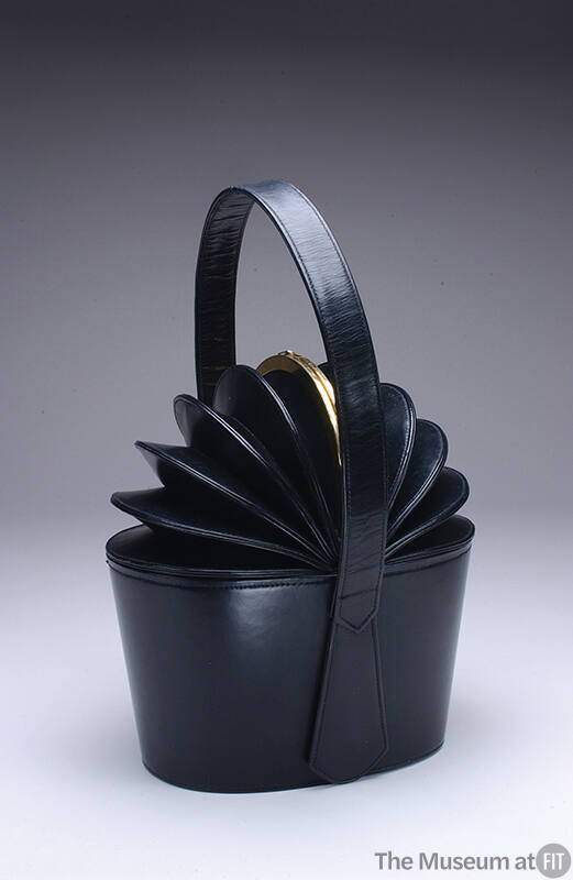 Black leather bucket bag with accordion top with gold clasp, top handle