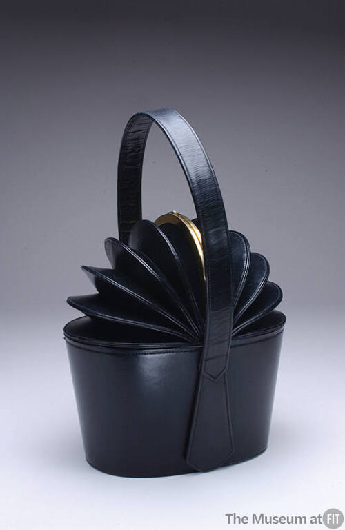 Black leather bucket bag with accordion top with gold clasp, top handle