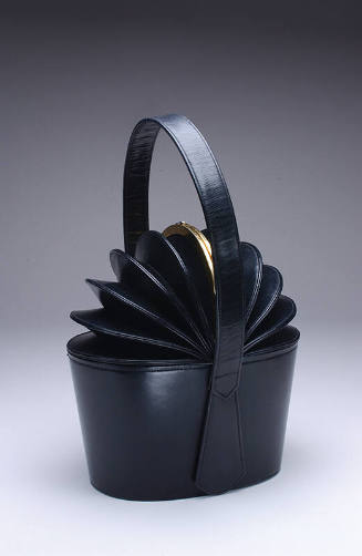 Black leather bucket bag with accordion top with gold clasp, top handle