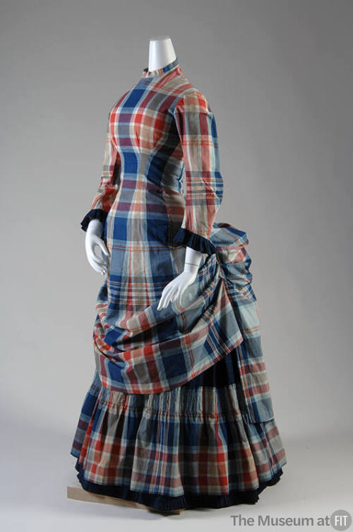 Blue, red, beige tartan long sleeve dress with back bustle and floor-length ruffled hem