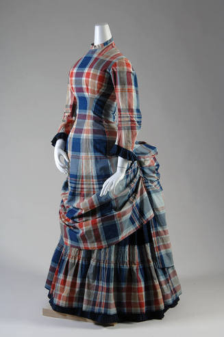 Blue, red, beige tartan long sleeve dress with back bustle and floor-length ruffled hem