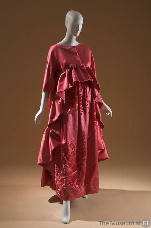 Dark pink evening gown, floral and leaf pattern and matching 3/4 sleeve coat with ruffles in fr…