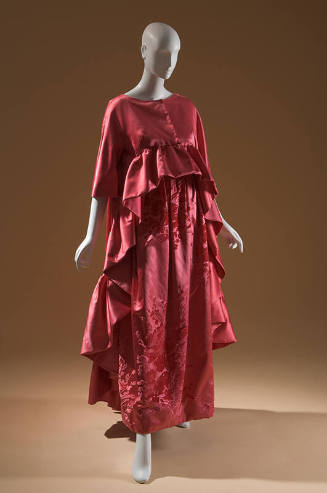 Dark pink evening gown, floral and leaf pattern and matching 3/4 sleeve coat with ruffles in fr…