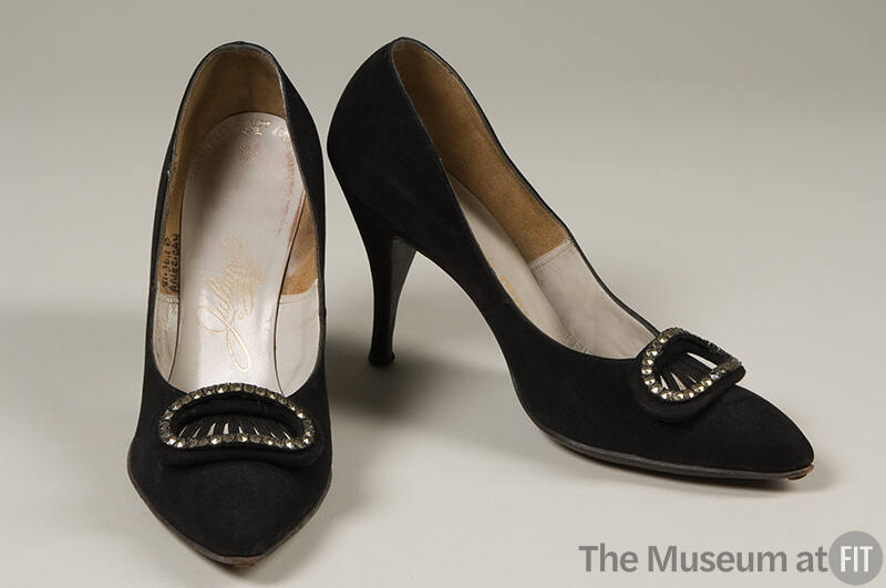 Black stiletto pumps with large oval rhinestone and faux buckle