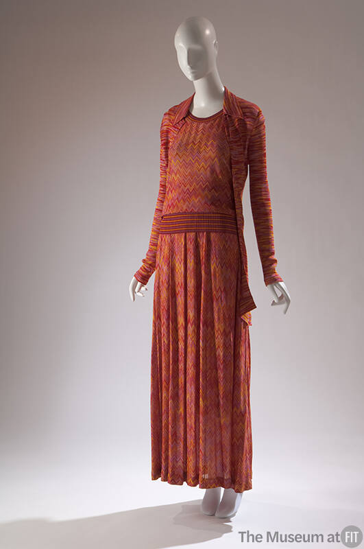 Three-piece set in red and orange knit: long sleeved cardigan with horizontal space-dye, top an…