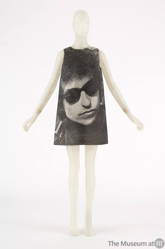 Sleeveless A-line mini dress with photo print of Bob Dylan wearing sunglasses