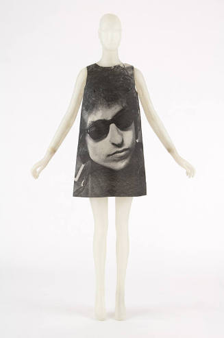 Sleeveless A-line mini dress with photo print of Bob Dylan wearing sunglasses