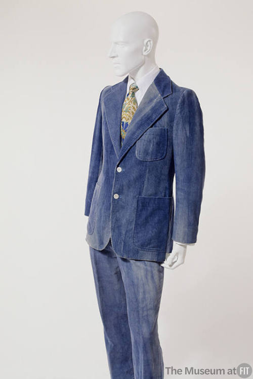 Blue corduroy suit with two button jacket, wide lapels and patch pockets and pants
