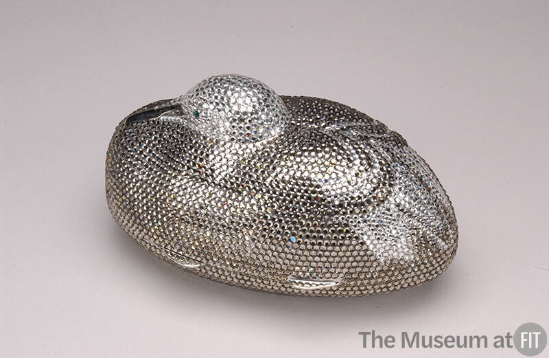 Small duck shaped handbag covered in rhinestones